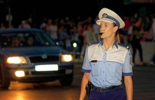 Police officer directing traffic.