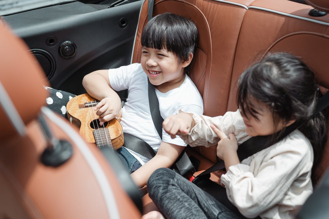 Children fastened in seat belts