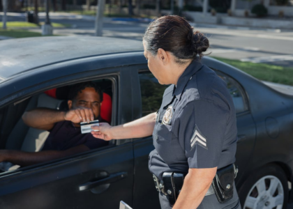 Officer checking a man’s driver’s license