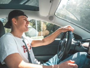 Young driver enjoying a car ride