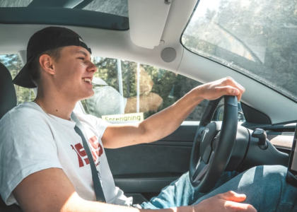 Young driver enjoying a car ride