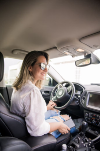 Person in a car smiling