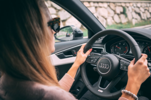 a woman driving a car