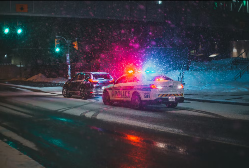 Police car pulls over suspected DUI driver who will need Minnesota SR22 insurance.