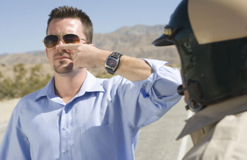A driver taking a sobriety test may have to pay fines for DUI in Florida.