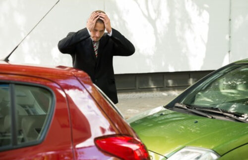 A man is upset about being in a car accident and will need affordable Maine SR22 insurance.